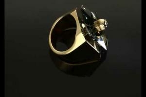 Swarovski Numina arany színű gyűrű nagy szürke kővel