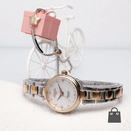 Gyémánttal díszített női Roamer óra  és Nomination karkötő