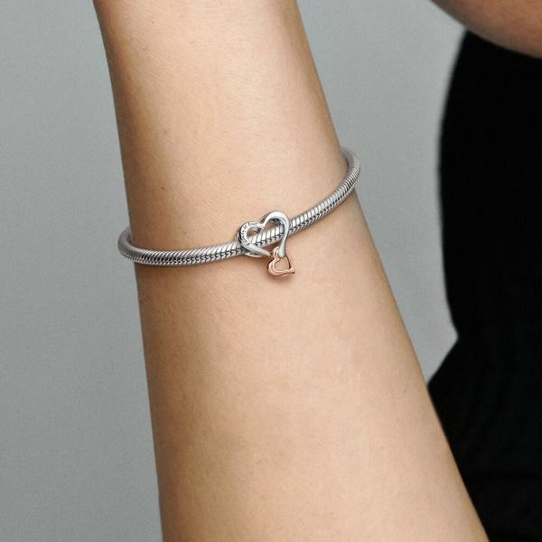 Pandora ékszer Kéttónusú áttört végtelen szív charm 782642C00