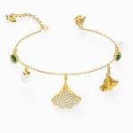 Swarovski Arany színű gingko karkötő 5518173