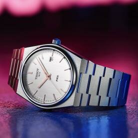 Tissot PRX quartz ezüst számlapos karóra T1374101103100
