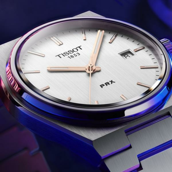 Tissot PRX quartz ezüst számlapos karóra T1374101103100