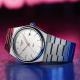 Tissot PRX quartz ezüst számlapos karóra T1374101103100