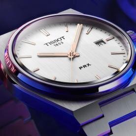Tissot PRX quartz ezüst számlapos karóra T1374101103100