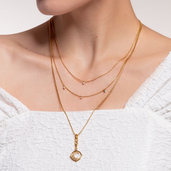 Thomas Sabo Forgó hold aranyozott ezüst charm cirkóniával 1855-959-7