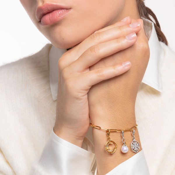 Thomas Sabo Forgó hold aranyozott ezüst charm cirkóniával 1855-959-7
