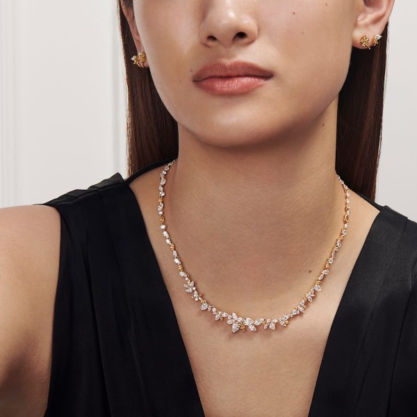 Swarovski Botanic arany színű fülbevaló fehés és sárga kristállyal 5535828