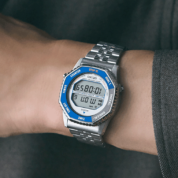 Seiko 'Rotocall' kék és szürke lünettás digitális quartz chronograph karóra SMGG21P1 Seiko 'Rotocall' kék és szürke lünettás digitális quartz chronograph karóra SMGG21P1