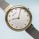 Bering Classic női óra arany tokkal kristállyal 12034-010