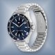 Tommy Hilfiger Logan ezüst színű férfi óra kék számlappal 1792012