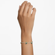 Swarovski Dellium arany színű karkötő zöld swarovski kristállyal 5645374