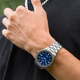 Tissot  PRC 100 Solar kék számlapos fémszíjas férfi karóra T1514221104100