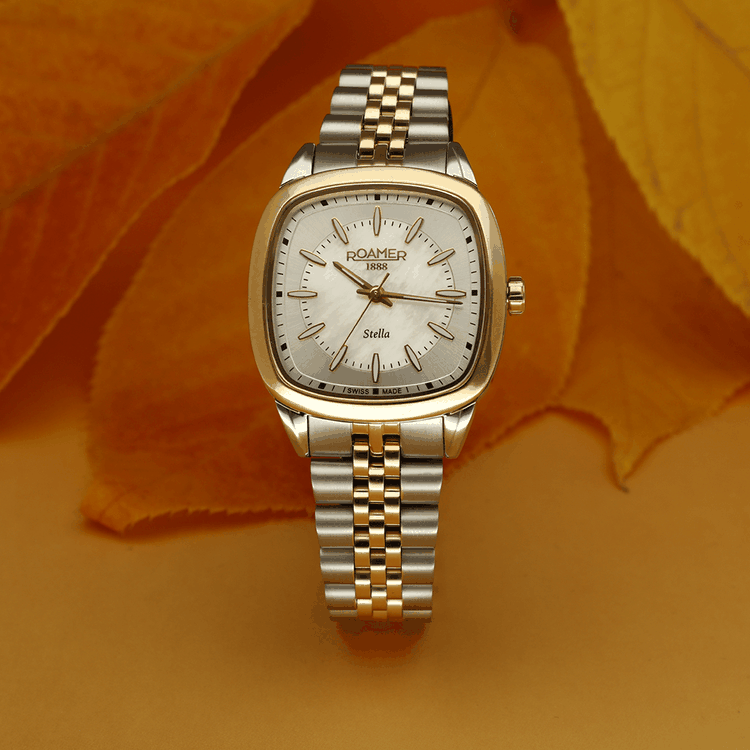 Roamer Stella arany és ezüst szíjas női karóra Roamer Stella arany és ezüst szíjas gyöngyház számlapos női óra
