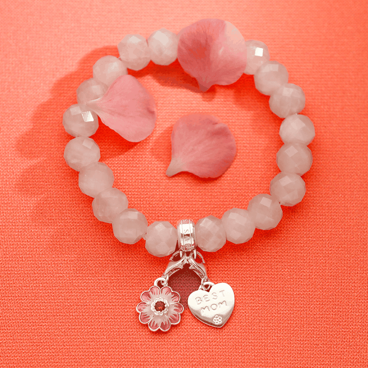 Rózsaszín gyöngyös Thomas Sabo karkötő szív és virág charmokkal, finom nőies stílusban