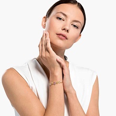 Swarovski Rózsaszín trópusi virág arany karkötő
